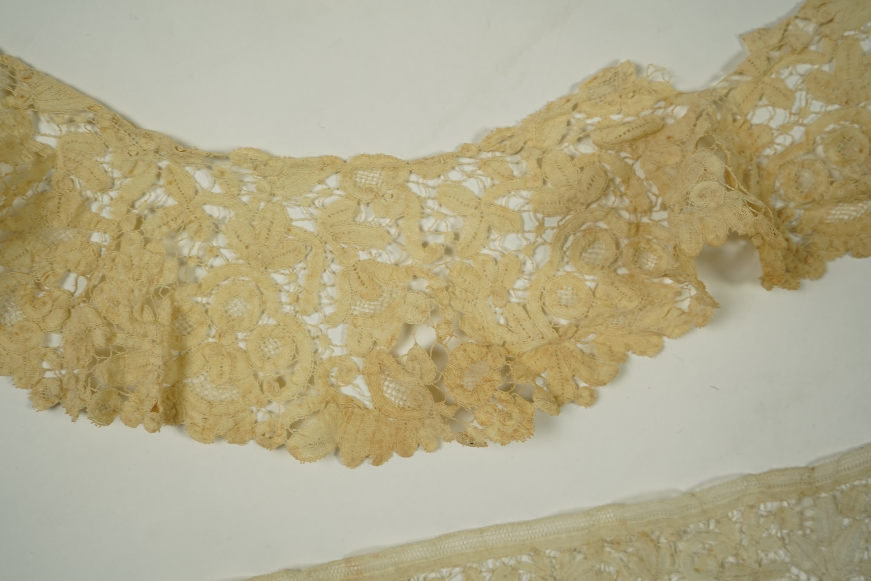 A mixed Brussels bobbin lace and Point de Gaze lace collar, another smaller collar, a similar length of trim and butterfly motif, together with a Brussels bobbin collar and trim, an Irish crochet cuffs, a Valenciennes la